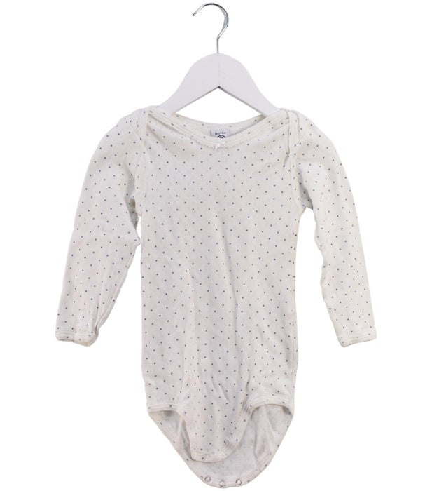 A White Long Sleeve Bodysuits from Petit Bateau in size 3T for girl. (Front View)