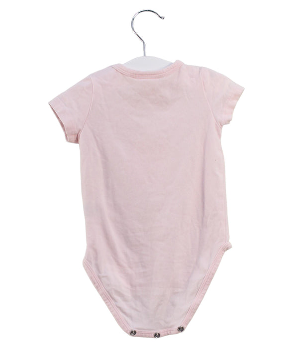 A Pink Short Sleeve Bodysuits from Seed in size 0-3M for girl. (Back View)