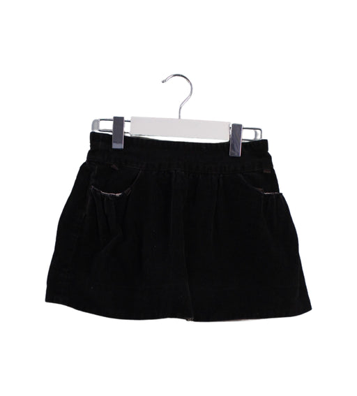 A Black Short Skirts from Bonpoint in size 4T for girl. (Front View)