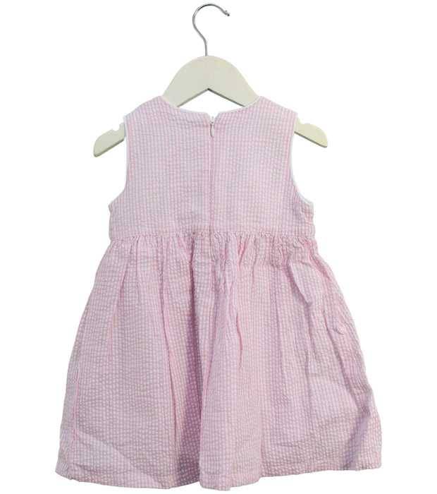 A Pink Sleeveless Dresses from Pan Con Chocolate in size 3T for girl. (Back View)