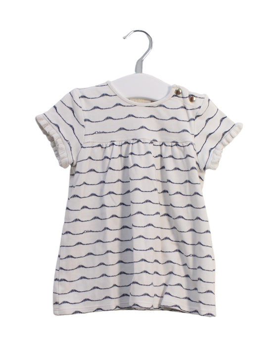 A White Short Sleeve Tops from Chloe in size 6-12M for girl. (Front View)