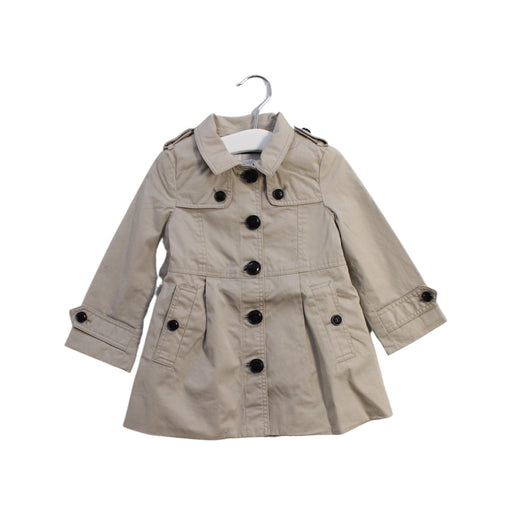 A Beige Coats from Burberry in size 6-12M for girl. (Front View)