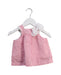 A Pink Sleeveless Dresses from Nanos in size 3-6M for girl. (Front View)