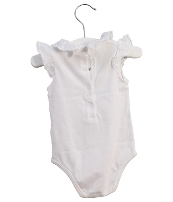 A White Sleeveless Bodysuits from Nanos in size 3-6M for girl. (Back View)