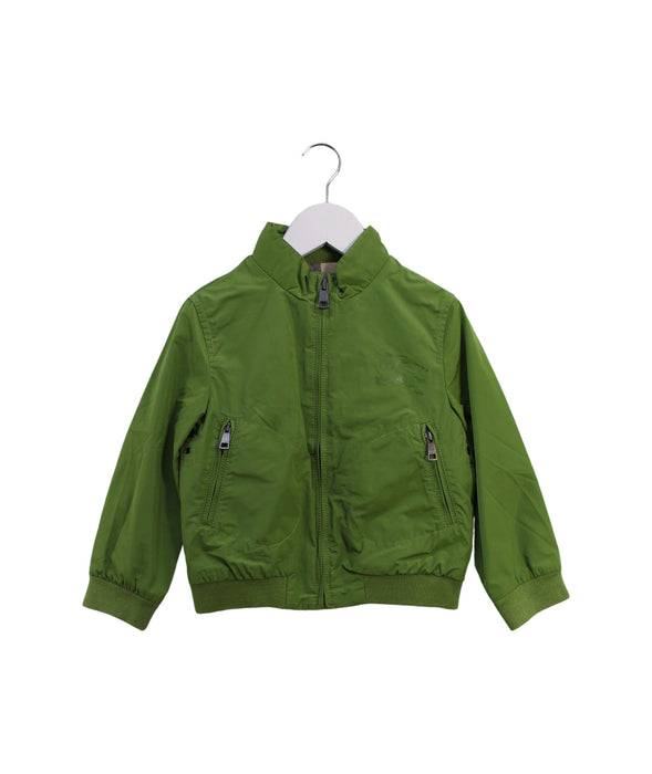 A Green Lightweight Jackets from Burberry in size 4T for boy. (Front View)
