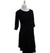 A Black Long Sleeve Dresses from Seraphine in size S for maternity. (Front View)