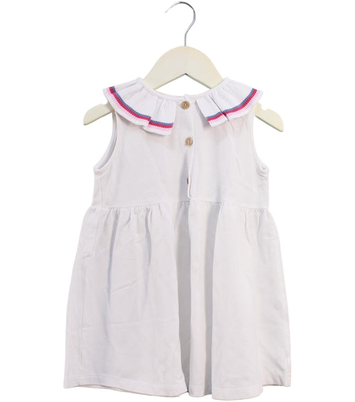 A White Sleeveless Dresses from Laranjinha in size 4T for girl. (Front View)