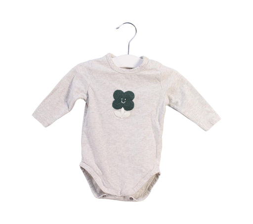 A White Long Sleeve Bodysuits from Seed in size 0-3M for girl. (Front View)