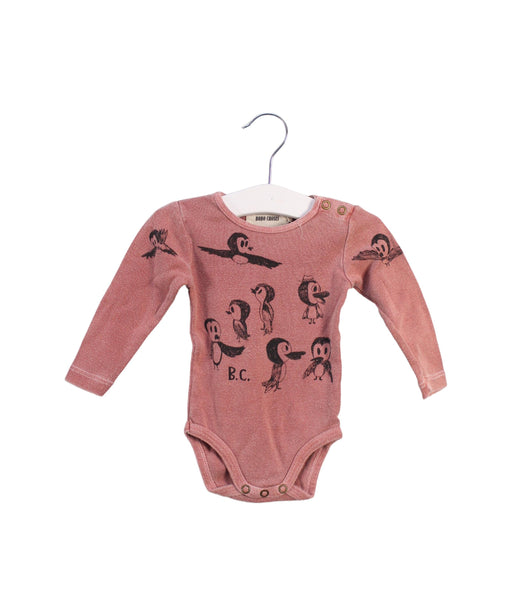 A Peach Long Sleeve Bodysuits from Bobo Choses in size 3-6M for girl. (Front View)
