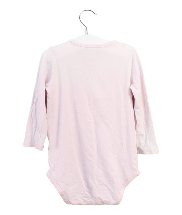 A Pink Long Sleeve Bodysuits from Seed in size 12-18M for girl. (Back View)