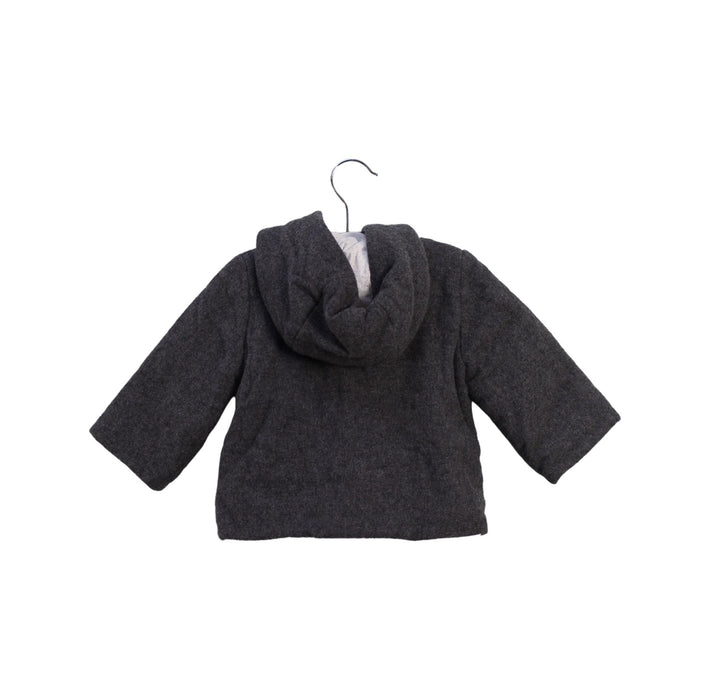 A Black Lightweight Jackets from Bonpoint in size 6-12M for boy. (Back View)