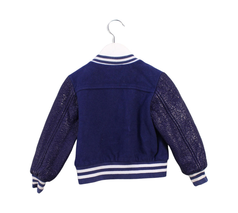 A Blue Lightweight Jackets from MSGM in size 4T for girl. (Back View)