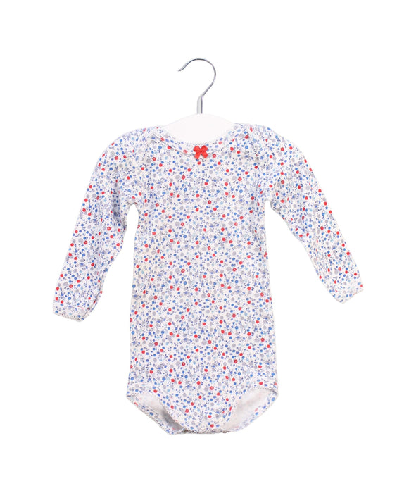 A White Long Sleeve Bodysuits from Petit Bateau in size 3-6M for girl. (Front View)