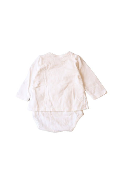 A Ivory Long Sleeve Bodysuits from Seed in size 3-6M for girl. (Back View)