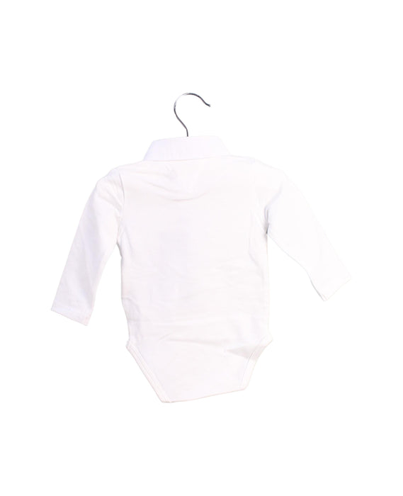 A White Long Sleeve Bodysuits from Tommy Hilfiger in size 0-3M for boy. (Back View)