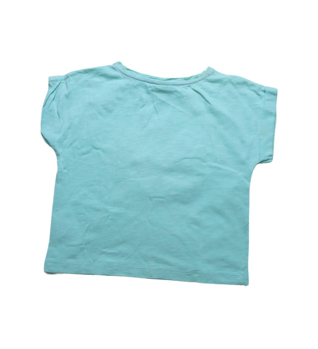 A Blue T Shirts from Frugi in size 5T for girl. (Back View)