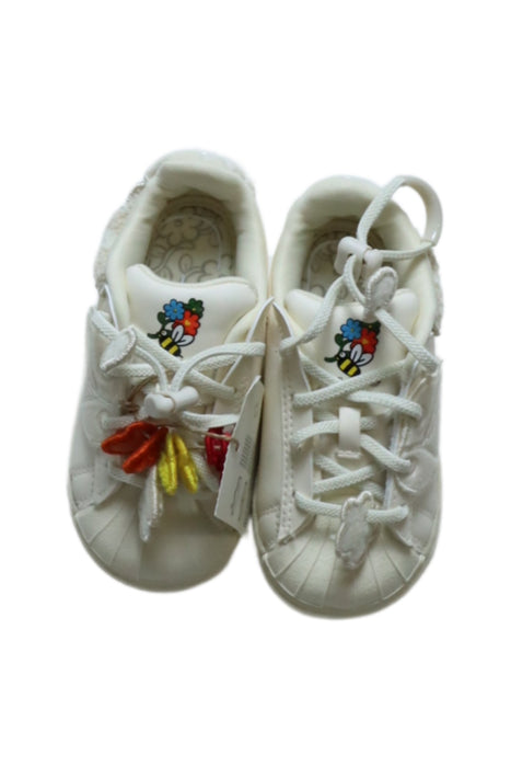 A White Sneakers from Adidas in size 18-24M for girl. (Back View)