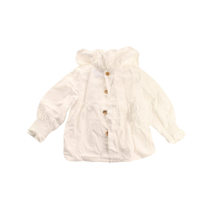 A Ivory Long Sleeve Tops from Cocote in size 6-12M for girl. (Back View)