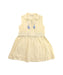 A Yellow Sleeveless Dresses from Caramel in size 3T for girl. (Front View)