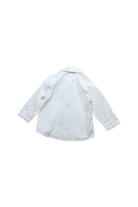 A Ivory Shirts from Dior in size 6-12M for boy. (Back View)