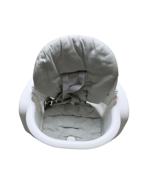 A White Chairs from Stokke in size 6-12M for neutral. (Front View)