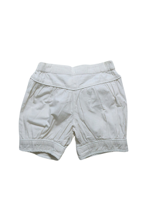 A Beige Shorts from Chickeeduck in size 4T for girl. (Front View)
