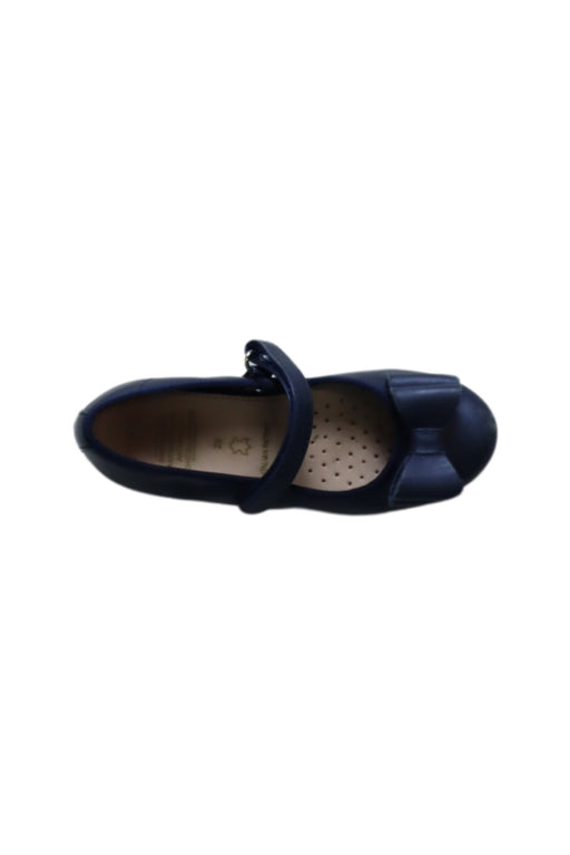 A Navy Flats from Geox in size 5T for girl. (Front View)