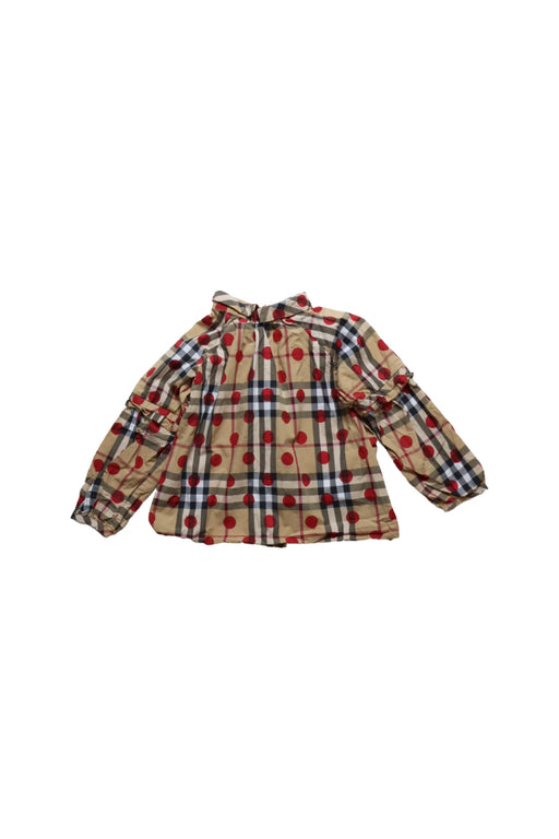 A Beige Long Sleeve Tops from Burberry in size 2T for girl. (Front View)