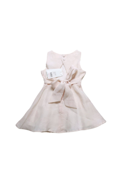 A White Sleeveless Dresses from Seed in size 2T for girl. (Back View)