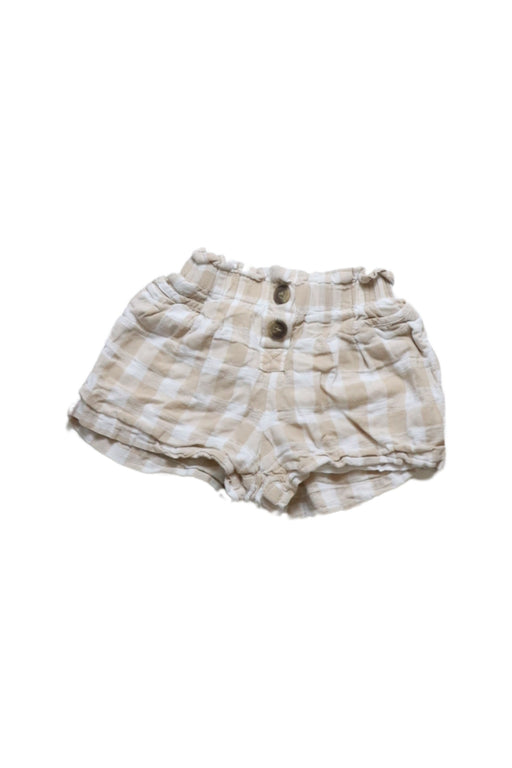 A Beige Shorts from Seed in size 4T for girl. (Front View)