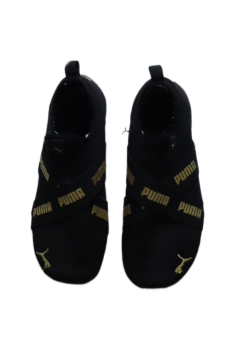 A Black Sneakers from Puma in size 7Y for boy. (Back View)