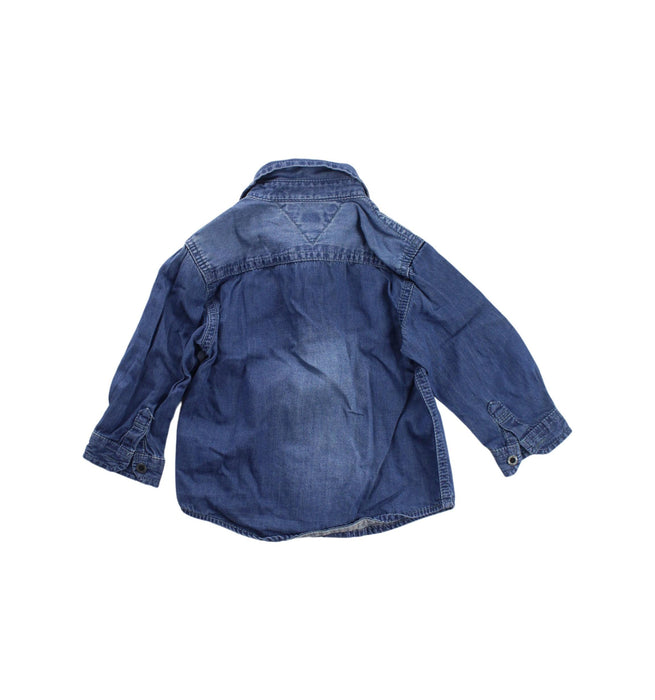 A Blue Shirts from Tommy Hilfiger in size 6-12M for boy. (Back View)