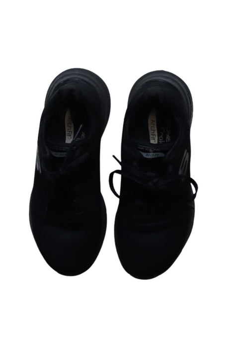 A Black Sneakers from Skechers in size 10Y for boy. (Back View)