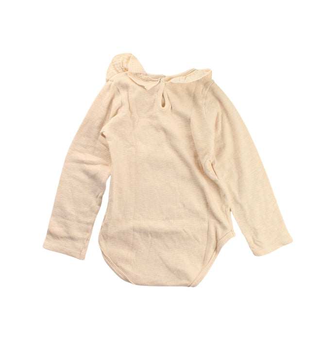A Beige Long Sleeve Bodysuits from Buho in size 2T for girl. (Back View)