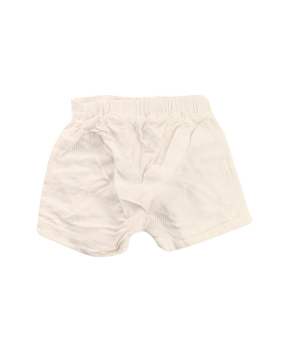 A White Shorts from Jacadi in size 6-12M for girl. (Back View)