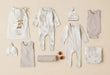 A White Gift Sets from Wilson & Frenchy in size Newborn for neutral. (Front View)