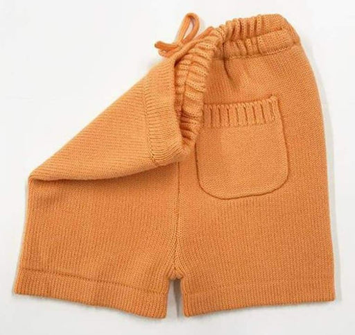 A Orange Shorts from Sloomb|Sustainablebabyish in size 18-24M for neutral. (Front View)