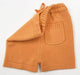 A Orange Shorts from Sloomb|Sustainablebabyish in size 18-24M for neutral. (Front View)
