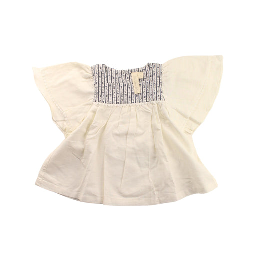 A White Short Sleeve Tops from Little Cotton Clothes in size 4T for girl. (Front View)