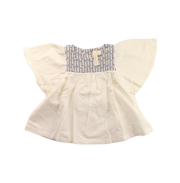 A White Short Sleeve Tops from Little Cotton Clothes in size 4T for girl. (Front View)