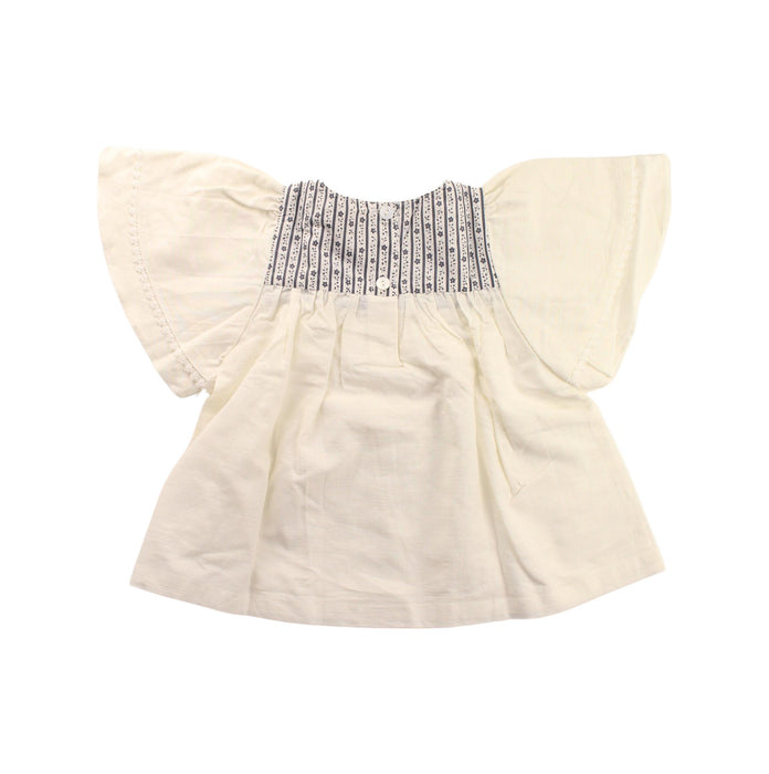 A White Short Sleeve Tops from Little Cotton Clothes in size 4T for girl. (Back View)