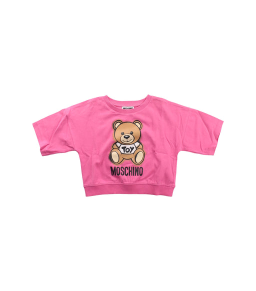 A Pink Short Sleeve T Shirts from Moschino in size 5T for girl. (Front View)