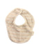 A Beige Bibs from Organic Natural Charm in size O/S for boy. (Back View)