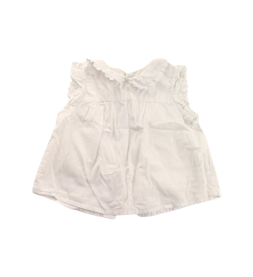 A White Sleeveless Dresses from Bonton in size 6-12M for girl. (Front View)