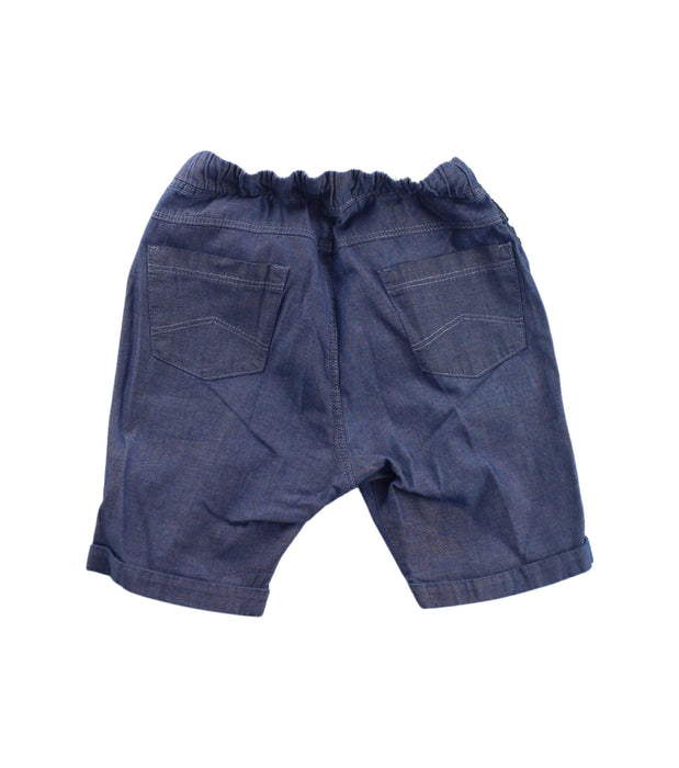 A Blue Shorts from Armani in size 6-12M for boy. (Back View)