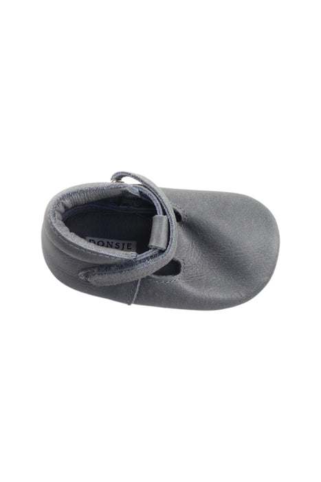 A Grey Flats from Donsje in size 12-18M for girl. (Front View)