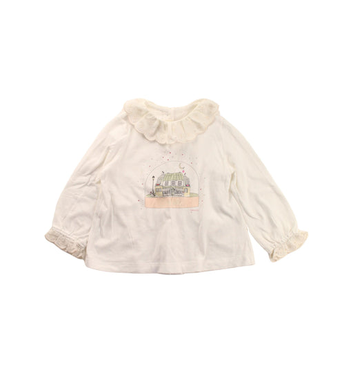 A Ivory Long Sleeve Tops from Nanos in size 12-18M for girl. (Front View)