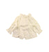 A Ivory Long Sleeve Tops from Louis Louise in size 6-12M for girl. (Back View)