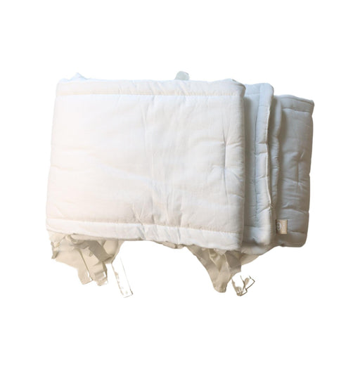 A White Crib Bumpers from Stokke in size O/S for neutral. (Front View)