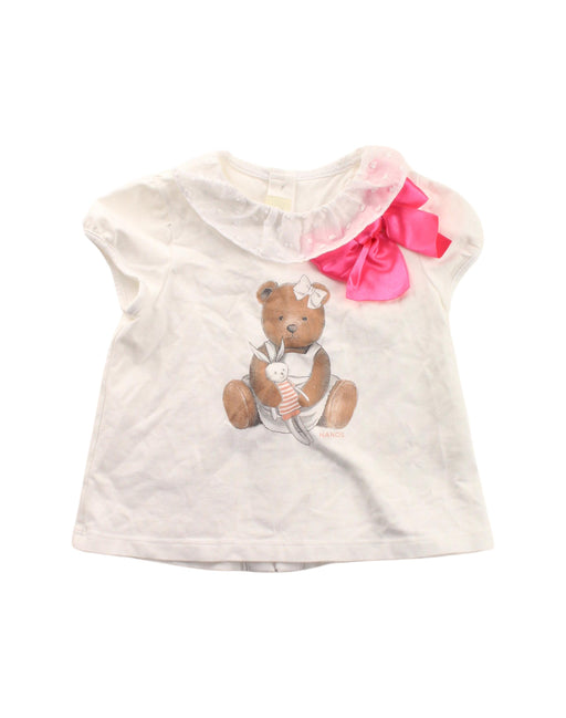 A White Short Sleeve Tops from Nanos in size 2T for girl. (Front View)